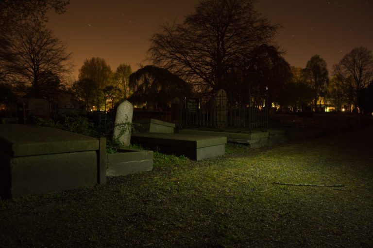 image of cemetery at night to represent the pathos of death